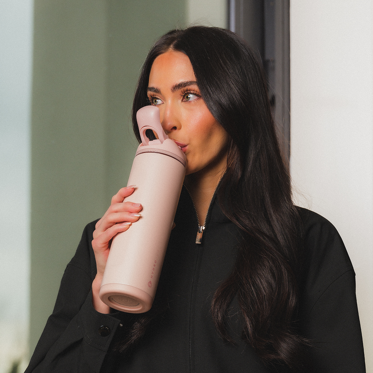 Woman Drinking from 24oz Dusty Rose HydroJug Ease2o