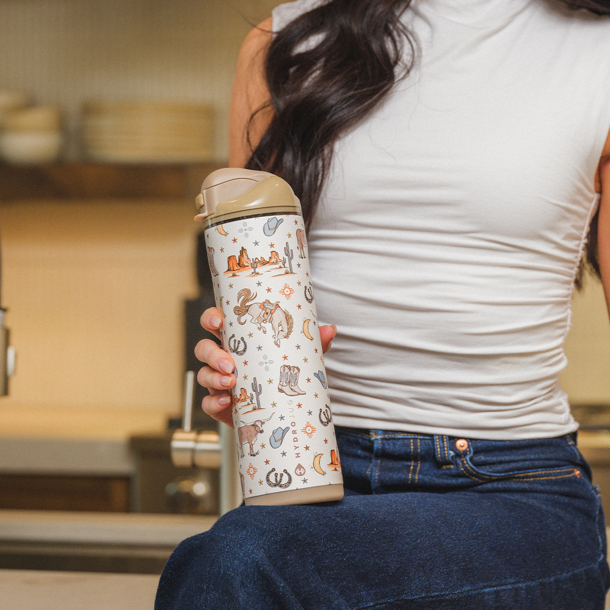 Person Holding 24oz Mesa HydroJug Ease2o