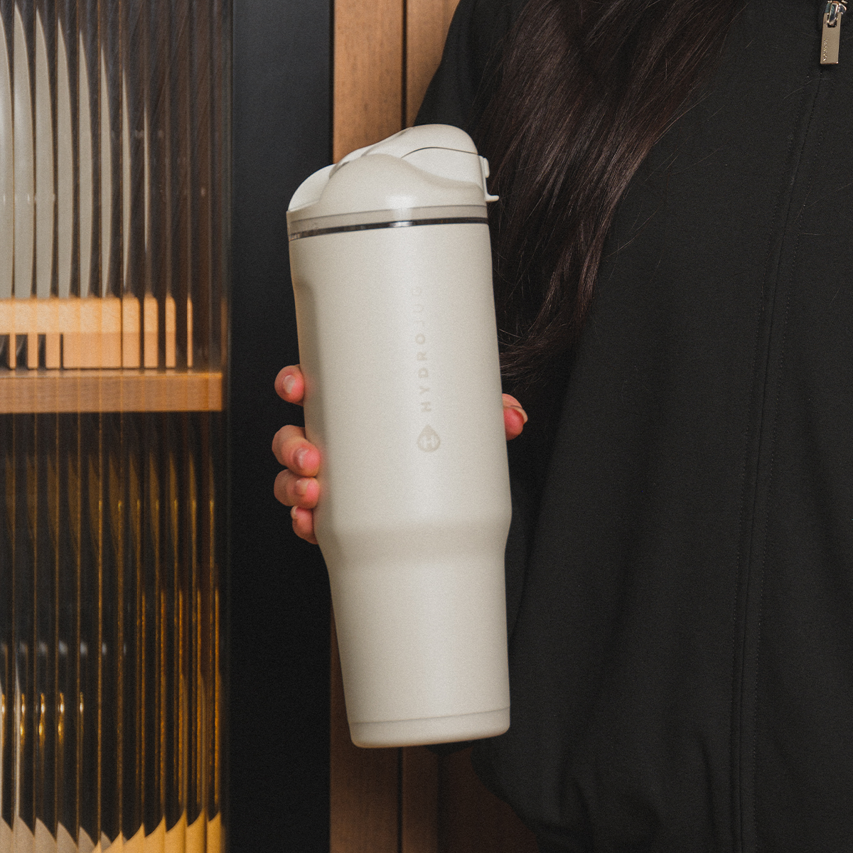 Person Holding 32oz Linen HydroJug Ease2o