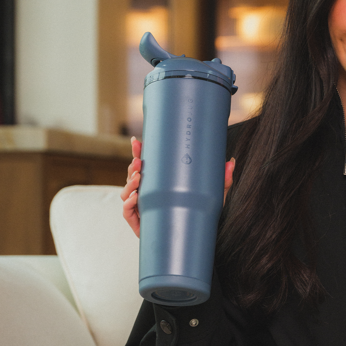 Person Holding 40oz Cascade HydroJug Ease2o