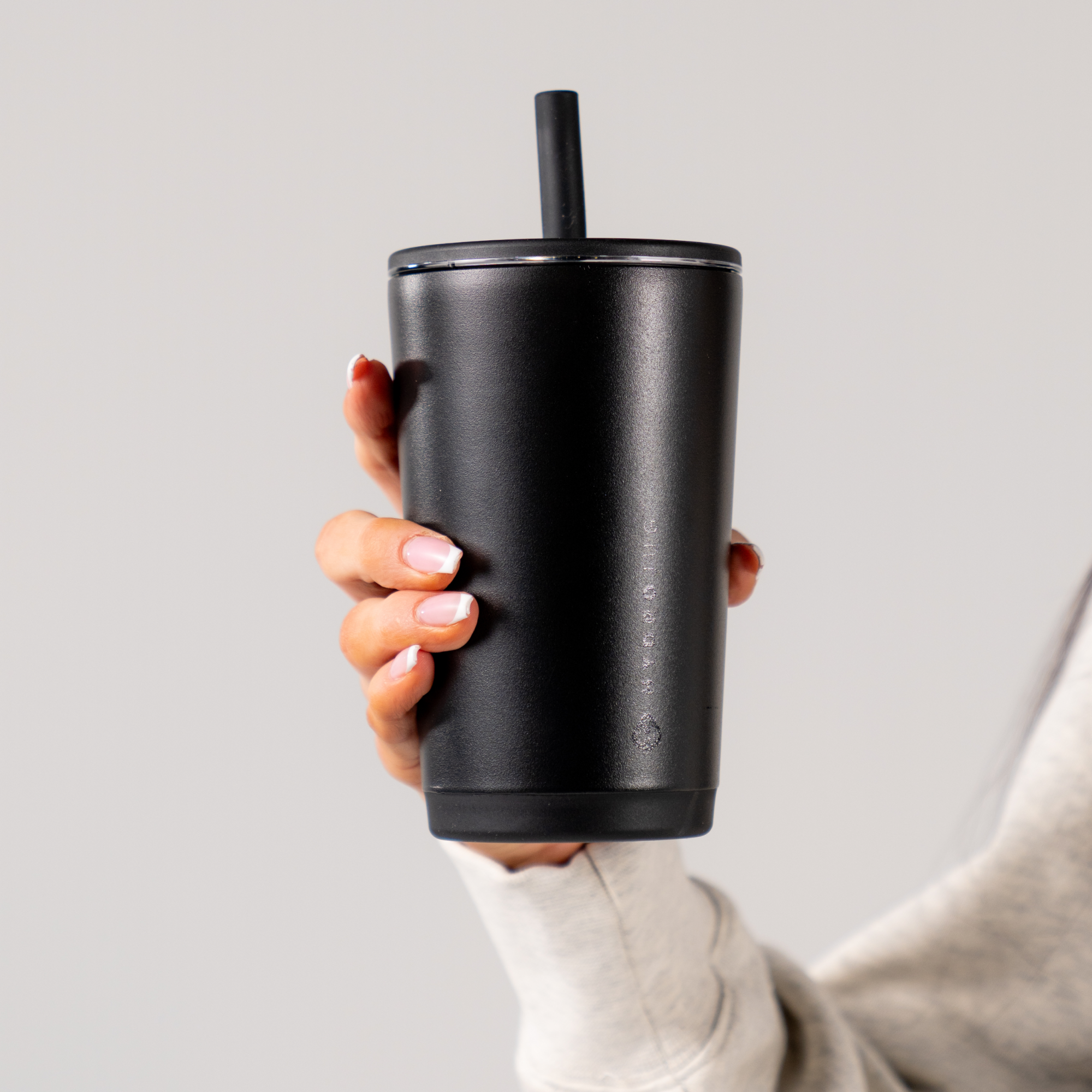 Hand Holding HydroJug Black Everyday Tumbler 14oz