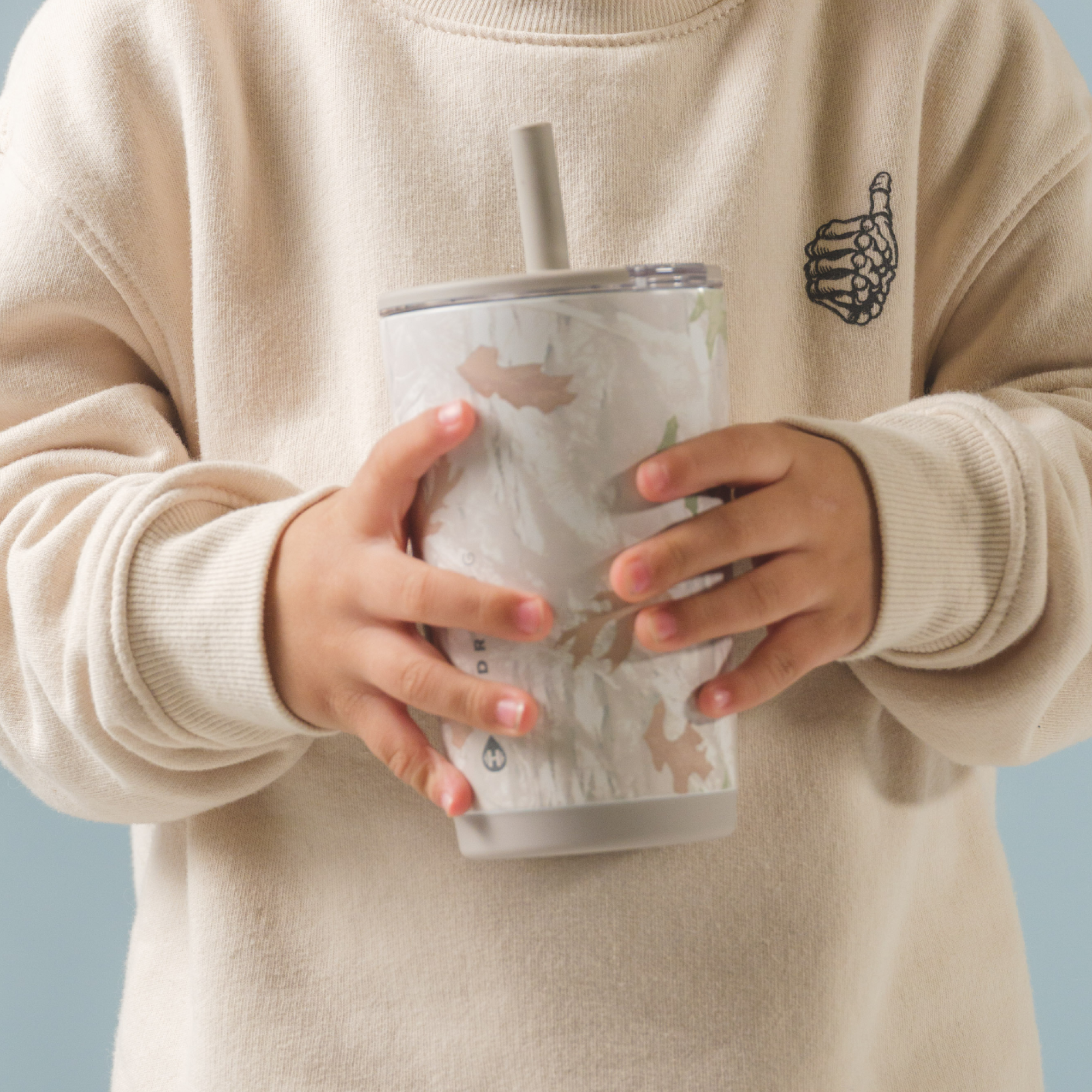 Hands Holding HydroJug Camo Everyday Tumbler 14oz