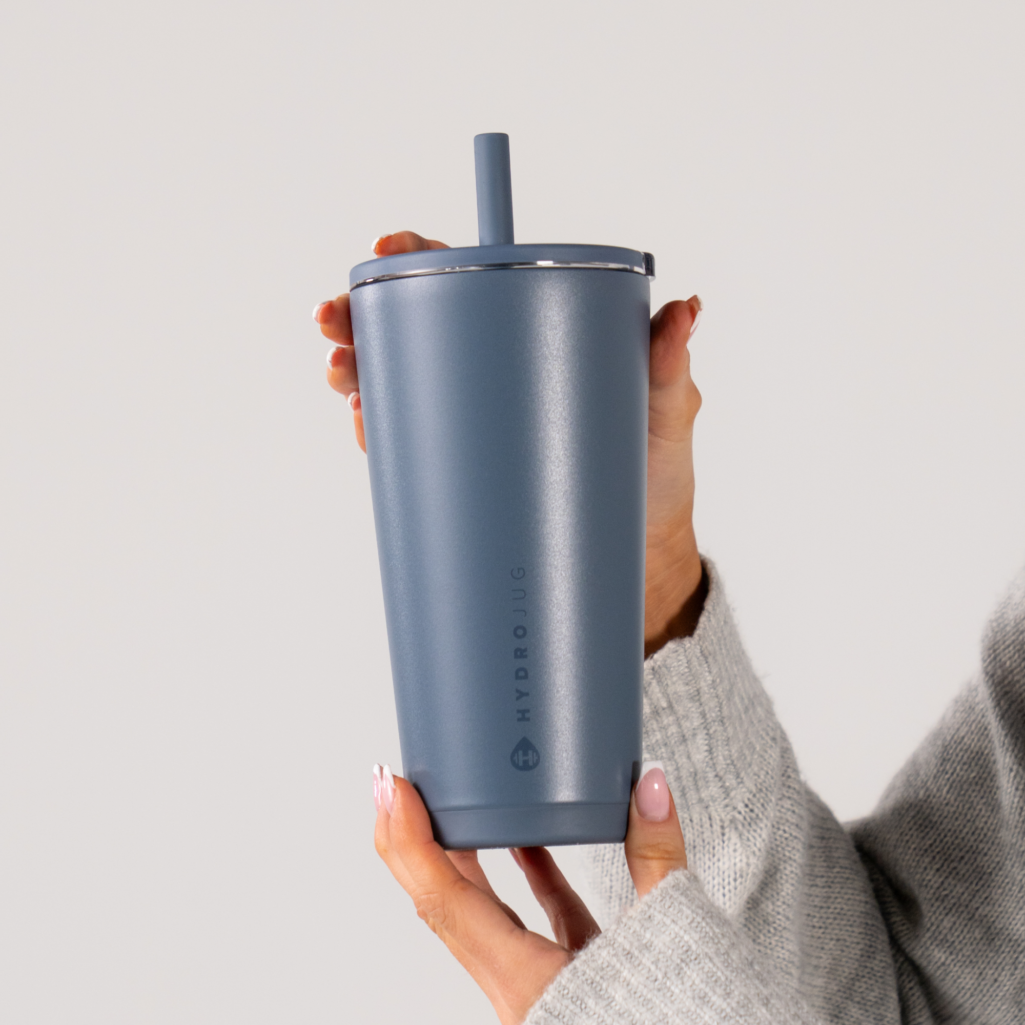 Hand Holding HydroJug Cascade Everyday Tumbler 20oz