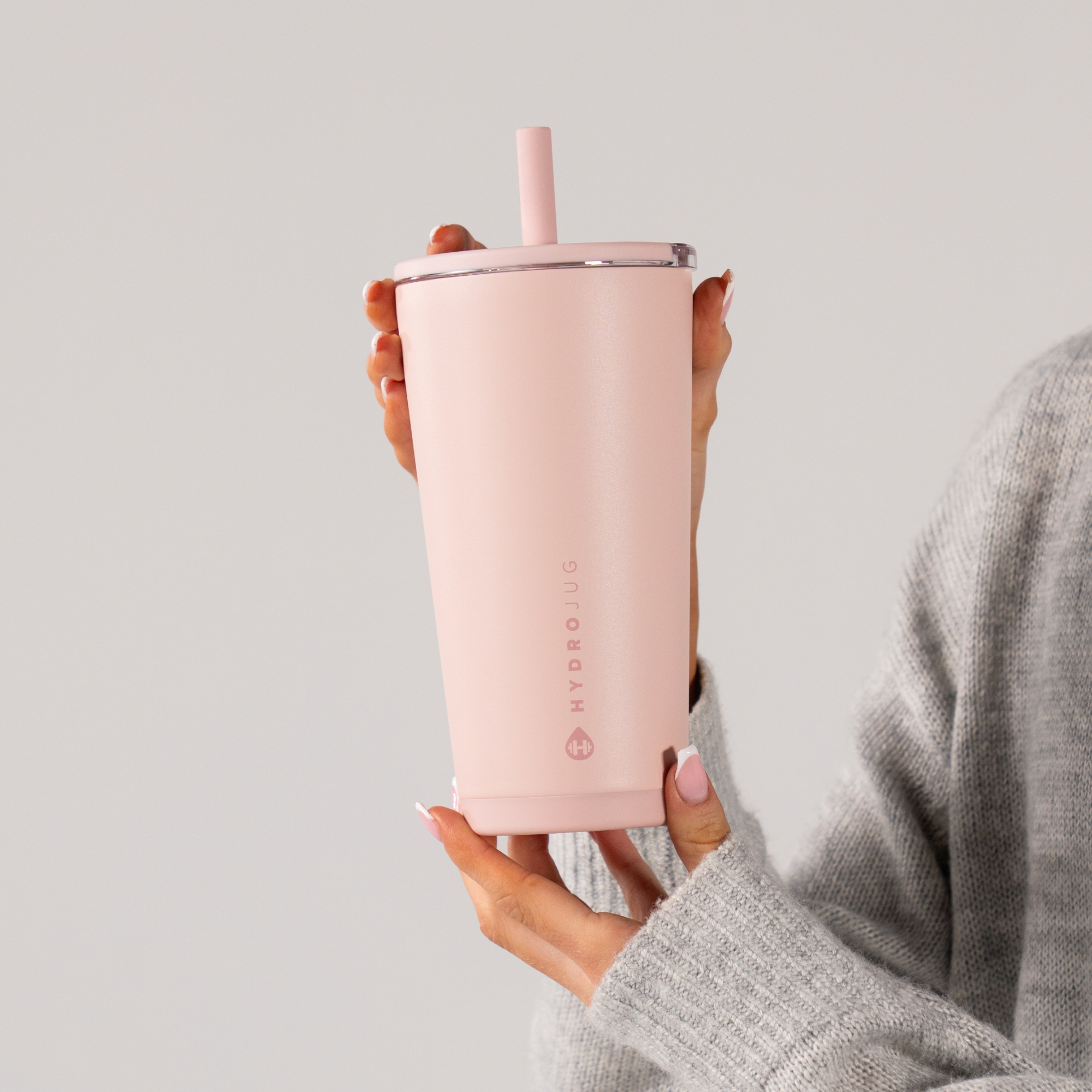 Hand Holding HydroJug Dusty Rose Everyday Tumbler 20oz